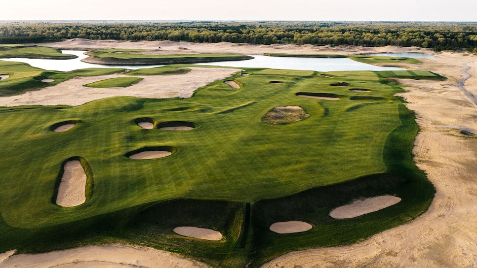 Golf course with bunkers and water features from an aerial view